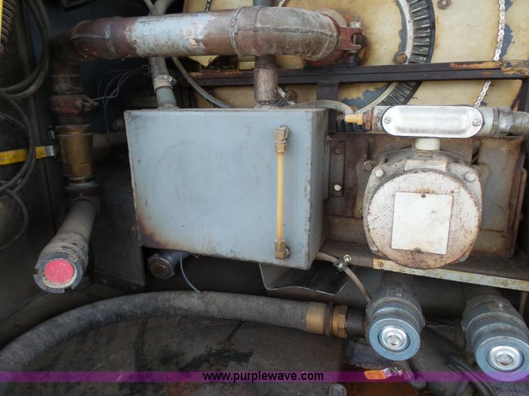 image for item K1169 1999 Freightliner FL70 fuel truck