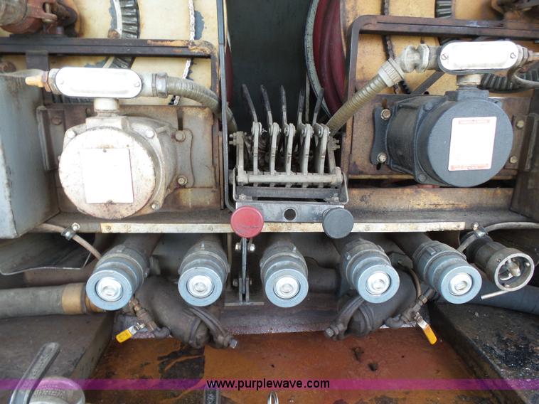 image for item K1169 1999 Freightliner FL70 fuel truck