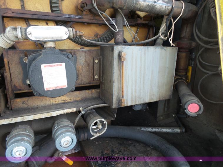 image for item K1169 1999 Freightliner FL70 fuel truck
