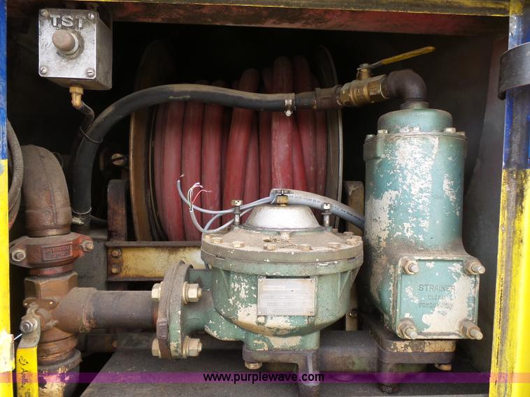 image for item K1169 1999 Freightliner FL70 fuel truck