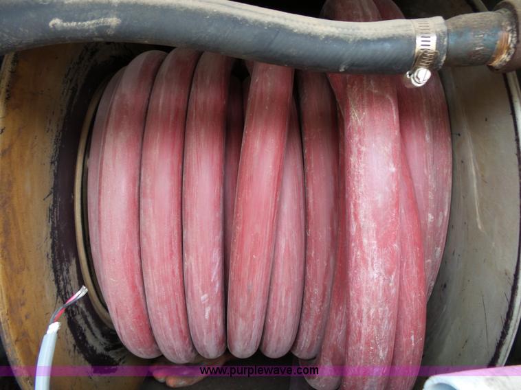 image for item K1169 1999 Freightliner FL70 fuel truck