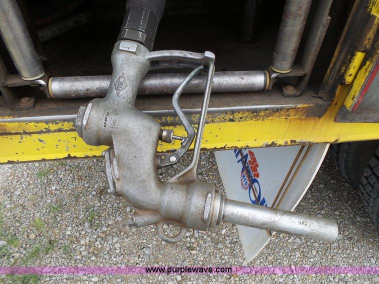 image for item K1169 1999 Freightliner FL70 fuel truck