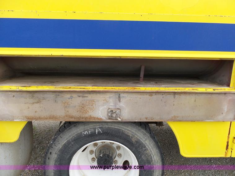 image for item K1169 1999 Freightliner FL70 fuel truck