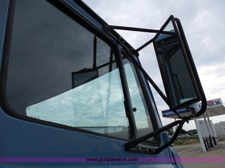 image for item K1169 1999 Freightliner FL70 fuel truck