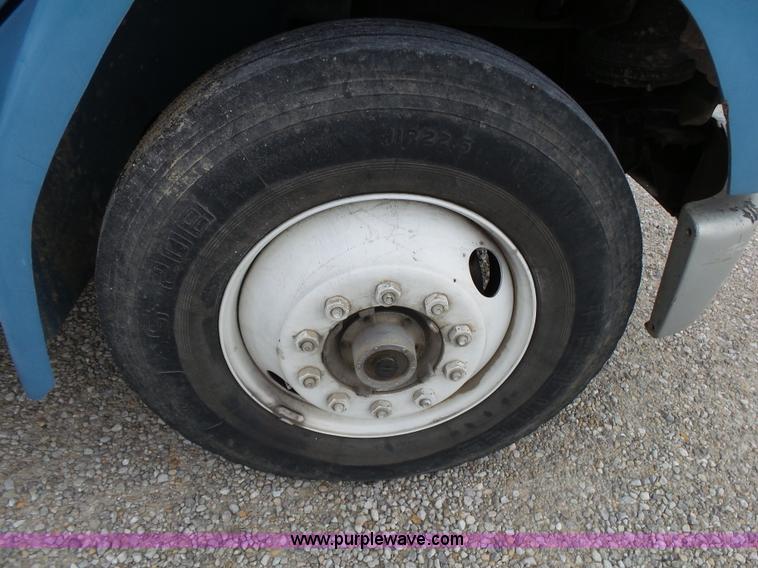 image for item K1169 1999 Freightliner FL70 fuel truck