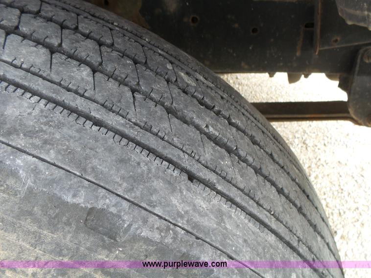 image for item K1169 1999 Freightliner FL70 fuel truck