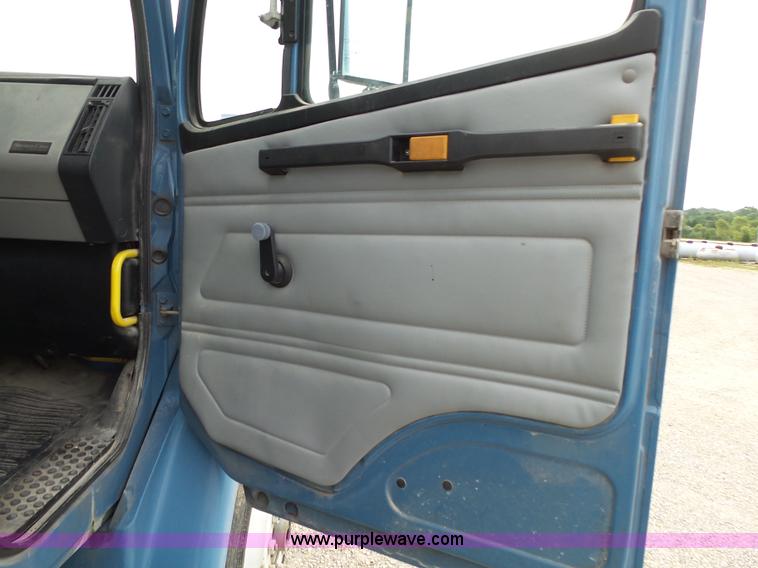 image for item K1169 1999 Freightliner FL70 fuel truck