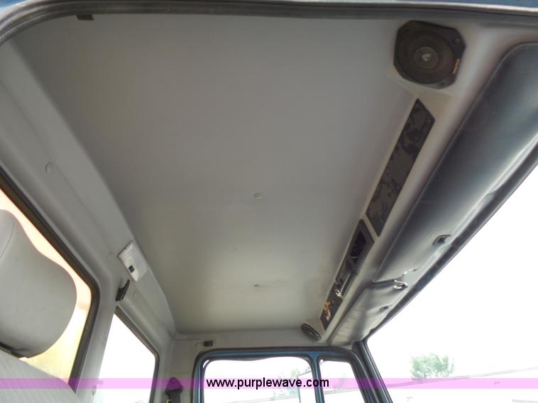 image for item K1169 1999 Freightliner FL70 fuel truck