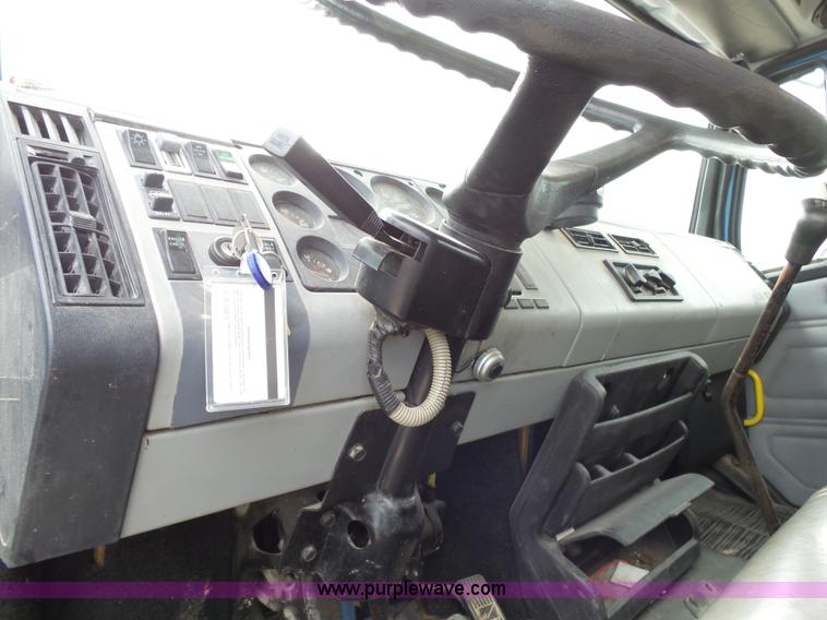 image for item K1169 1999 Freightliner FL70 fuel truck