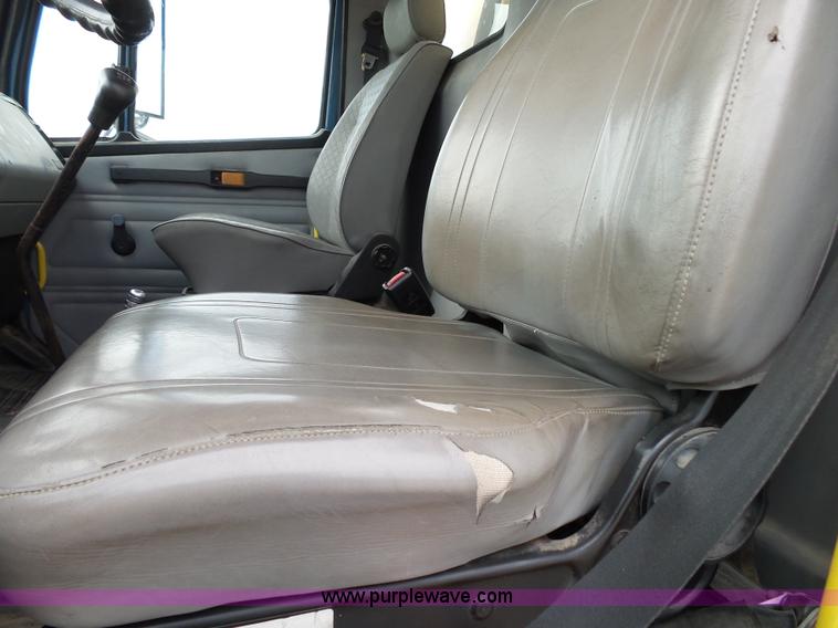 image for item K1169 1999 Freightliner FL70 fuel truck