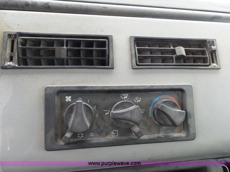 image for item K1169 1999 Freightliner FL70 fuel truck