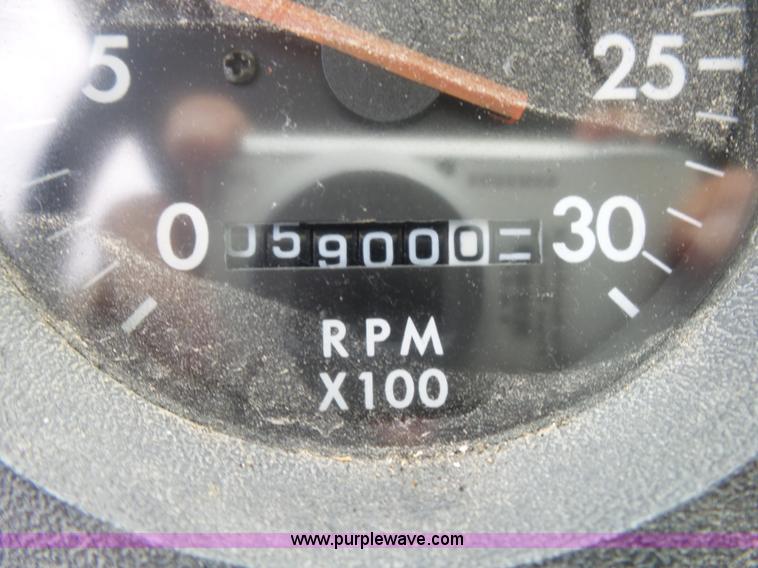 image for item K1169 1999 Freightliner FL70 fuel truck