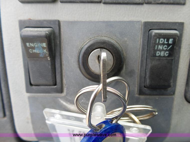 image for item K1169 1999 Freightliner FL70 fuel truck