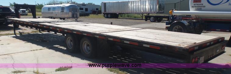 image for item L5974 2009 RMST flatbed trailer