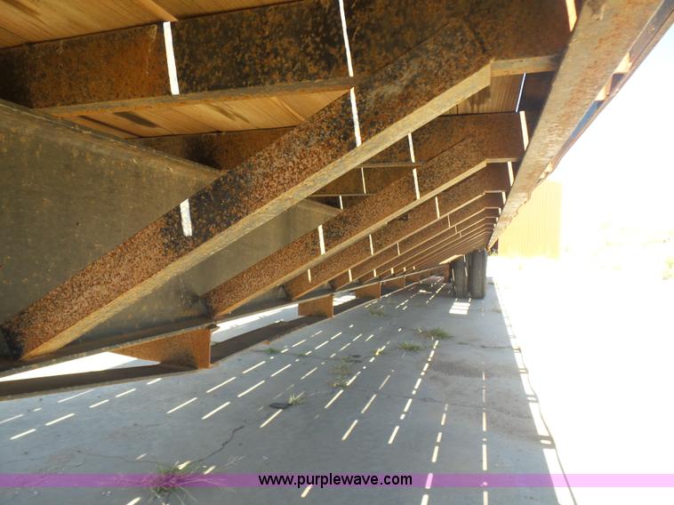 image for item L5974 2009 RMST flatbed trailer