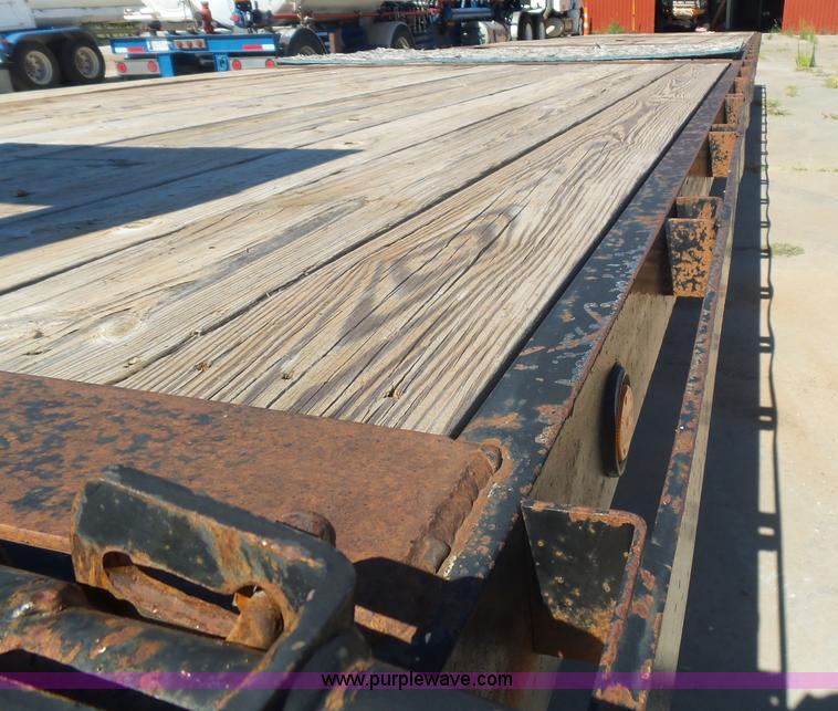 image for item L5974 2009 RMST flatbed trailer