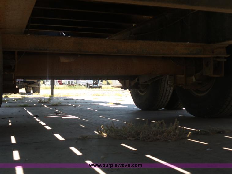 image for item L5974 2009 RMST flatbed trailer
