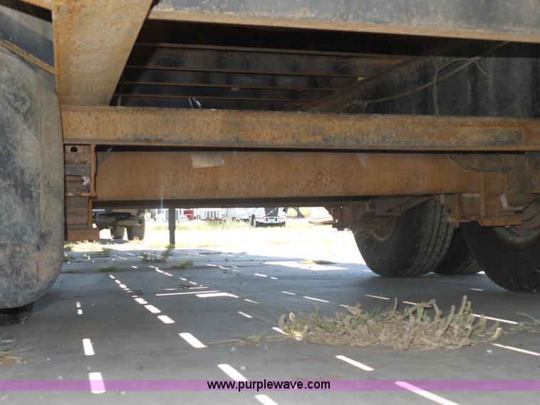 image for item L5974 2009 RMST flatbed trailer