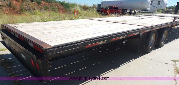 image for item L5974 2009 RMST flatbed trailer