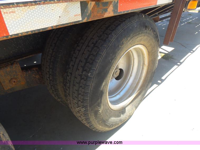 image for item L5974 2009 RMST flatbed trailer