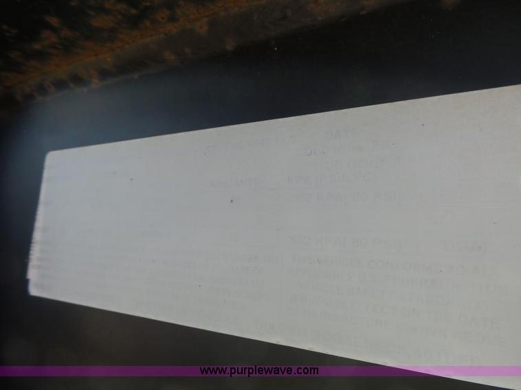 image for item L5974 2009 RMST flatbed trailer