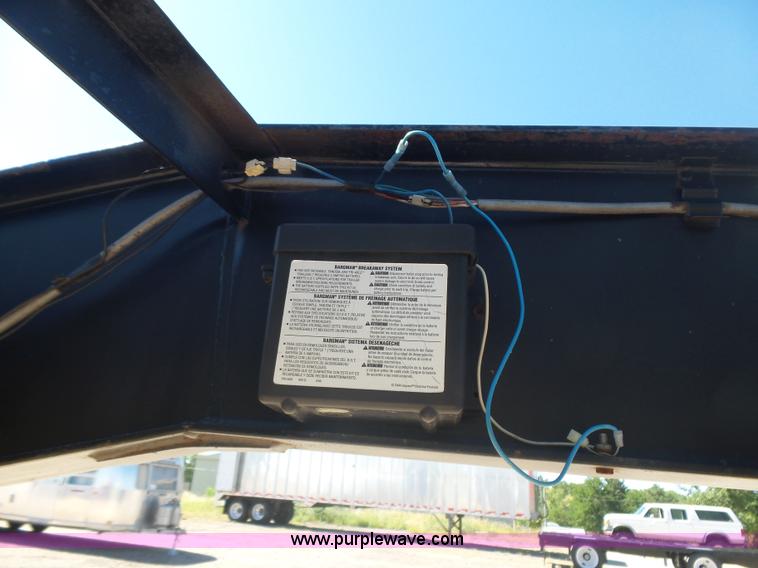 image for item L5974 2009 RMST flatbed trailer