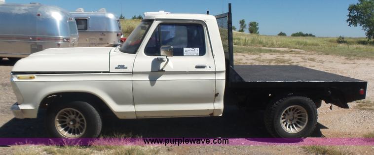 image for item L5977 1977 Ford F100 flatbed pickup truck