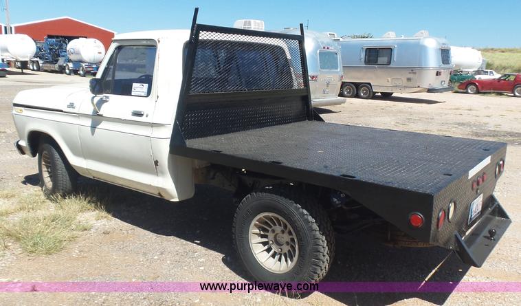image for item L5977 1977 Ford F100 flatbed pickup truck