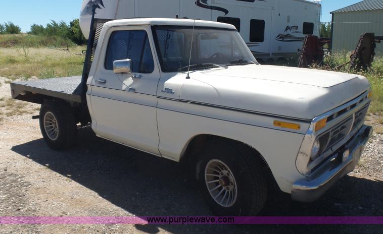 image for item L5977 1977 Ford F100 flatbed pickup truck