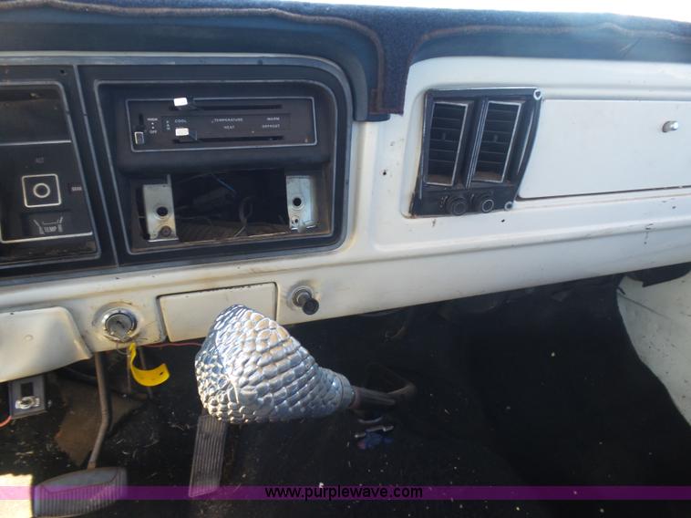 image for item L5977 1977 Ford F100 flatbed pickup truck