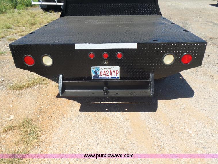 image for item L5977 1977 Ford F100 flatbed pickup truck