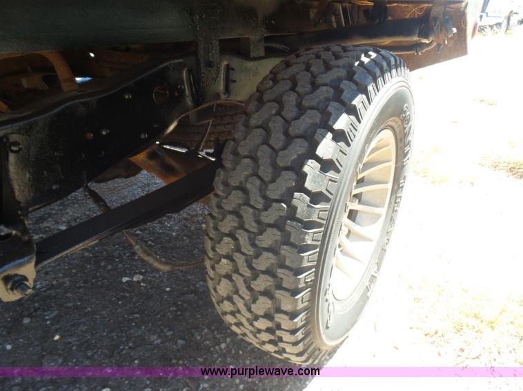 image for item L5977 1977 Ford F100 flatbed pickup truck