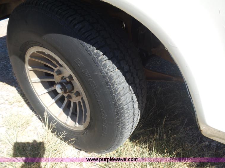 image for item L5977 1977 Ford F100 flatbed pickup truck