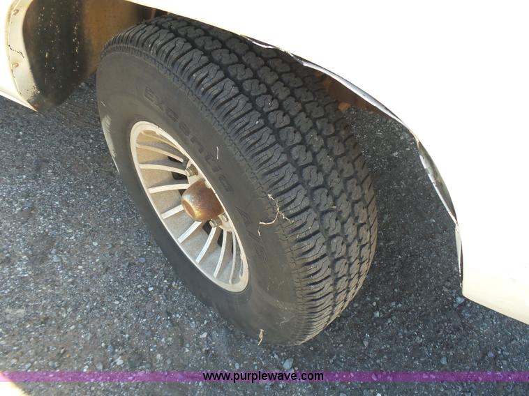 image for item L5977 1977 Ford F100 flatbed pickup truck