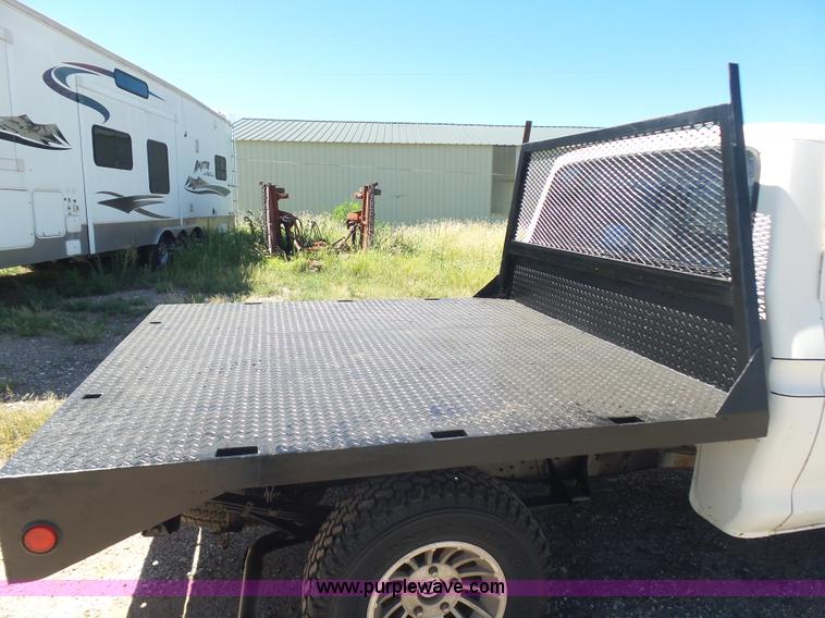 image for item L5977 1977 Ford F100 flatbed pickup truck