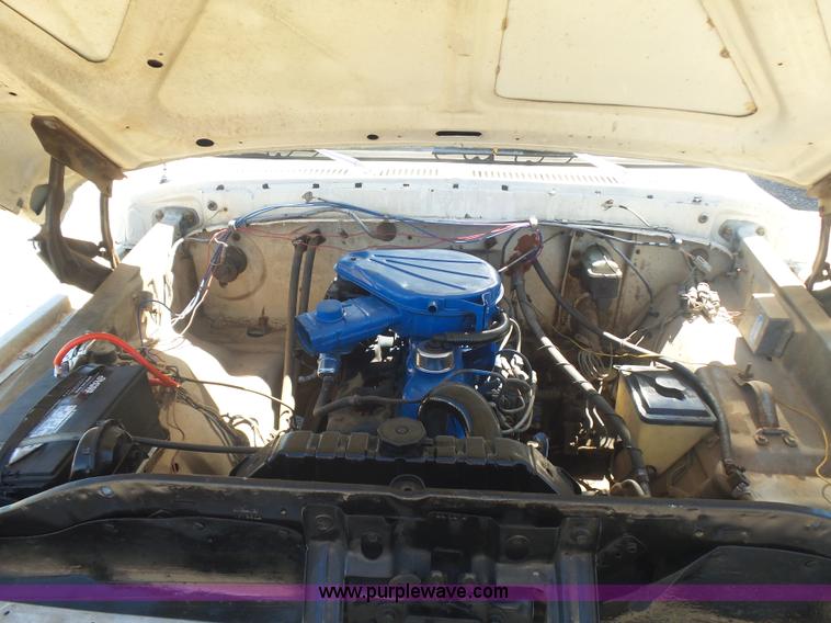 image for item L5977 1977 Ford F100 flatbed pickup truck