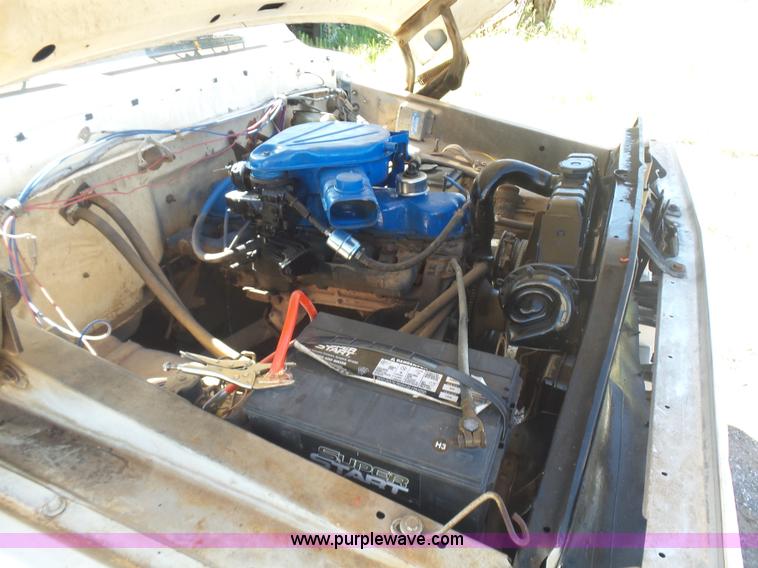 image for item L5977 1977 Ford F100 flatbed pickup truck