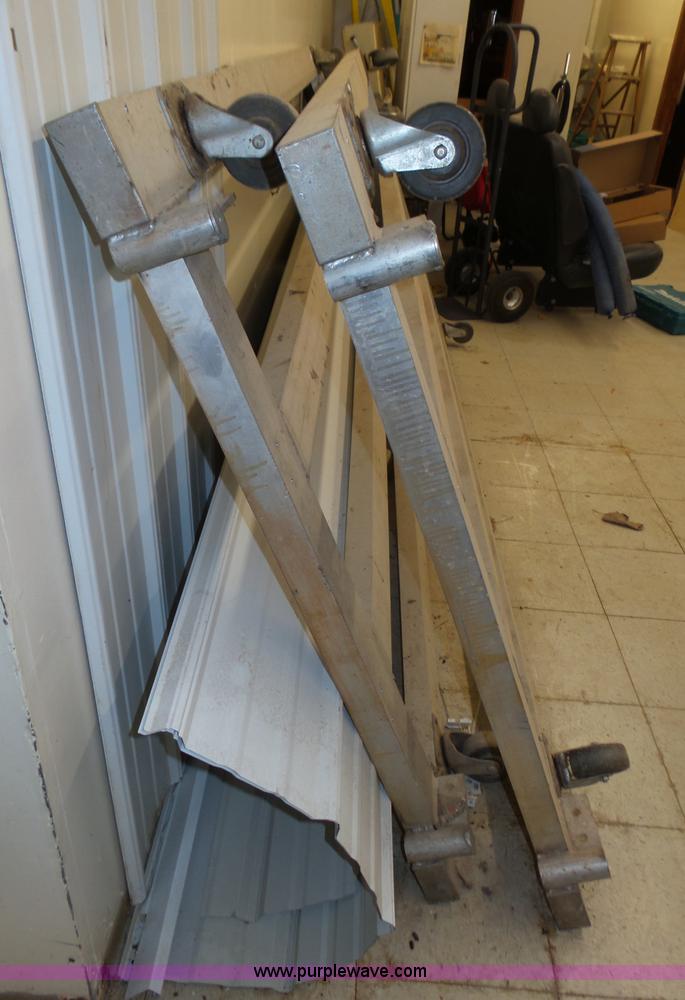 image for item BX9160 (2) aluminum four wheel dollies