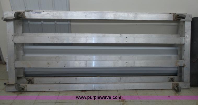 image for item BX9160 (2) aluminum four wheel dollies