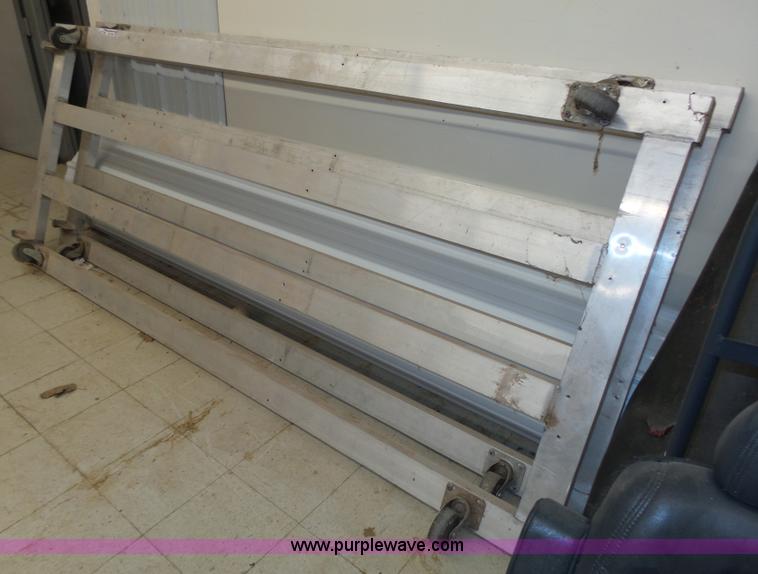 image for item BX9160 (2) aluminum four wheel dollies