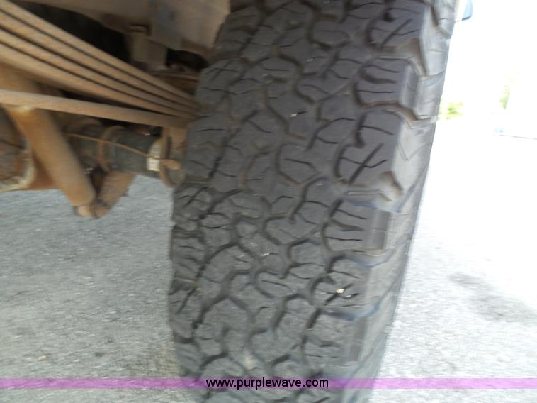 image for item J4001 1999 Ford F250 Super Duty utility truck