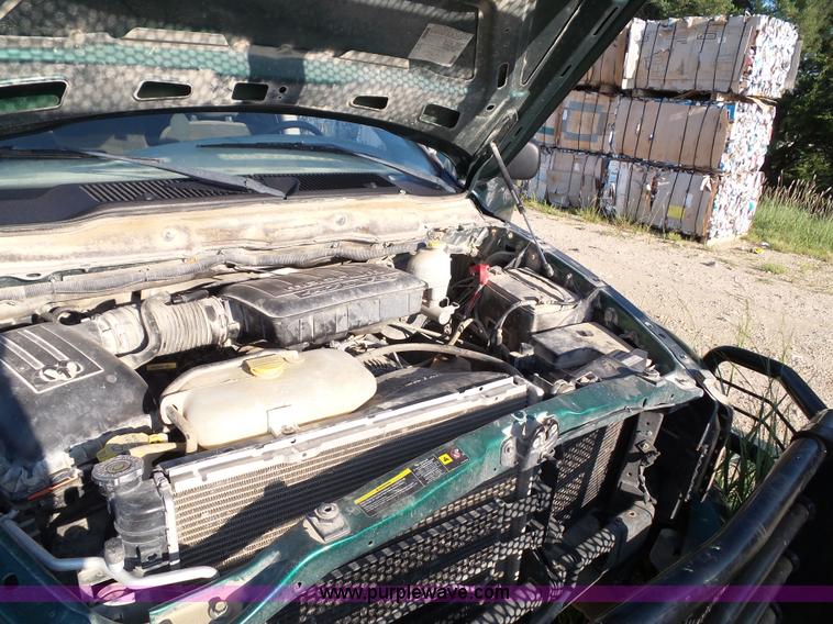 image for item J4004 2004 Dodge Ram 1500 Quad Cab pickup truck