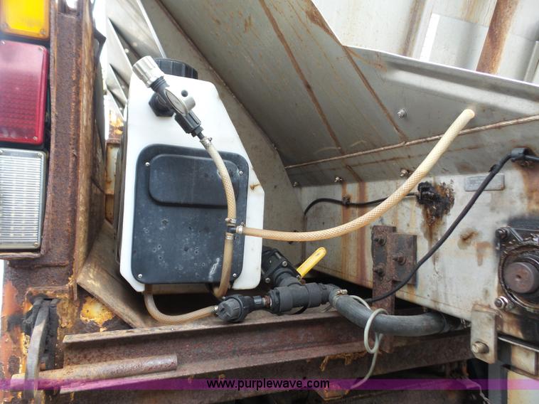 image for item L4976 2003 Freightliner FL80 dump truck