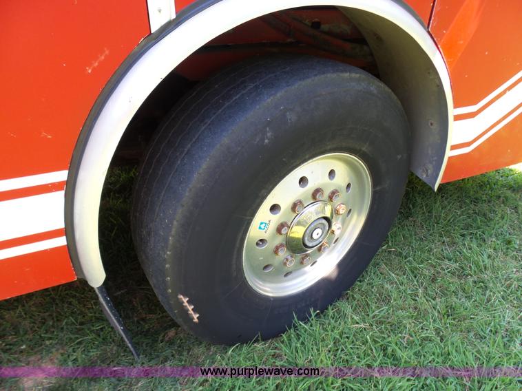 image for item L7087 1996 Sutphen Crew Cab ladder fire truck