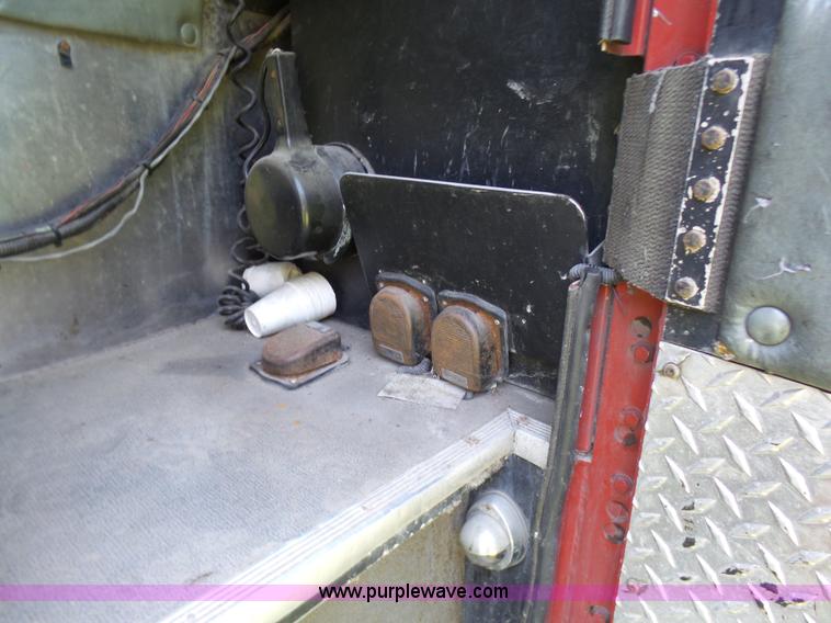 image for item L7087 1996 Sutphen Crew Cab ladder fire truck