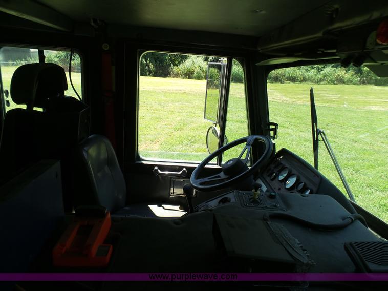 image for item L7087 1996 Sutphen Crew Cab ladder fire truck