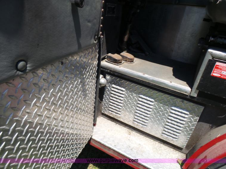 image for item L7087 1996 Sutphen Crew Cab ladder fire truck