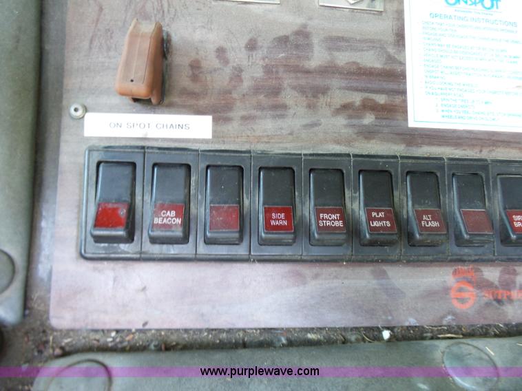 image for item L7087 1996 Sutphen Crew Cab ladder fire truck