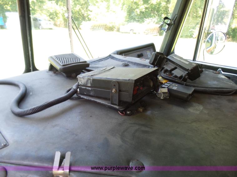 image for item L7087 1996 Sutphen Crew Cab ladder fire truck