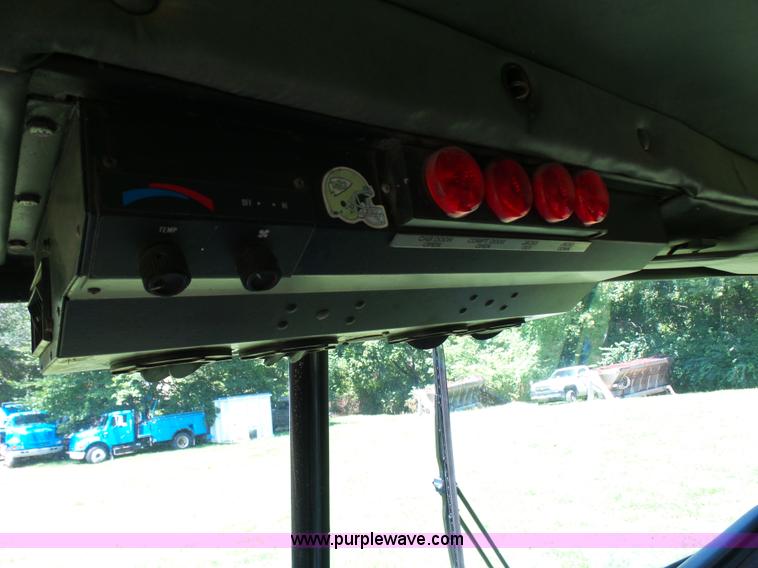 image for item L7087 1996 Sutphen Crew Cab ladder fire truck